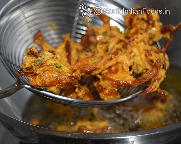 Crispy pakoda is now golden brown & crisp, remove from oil