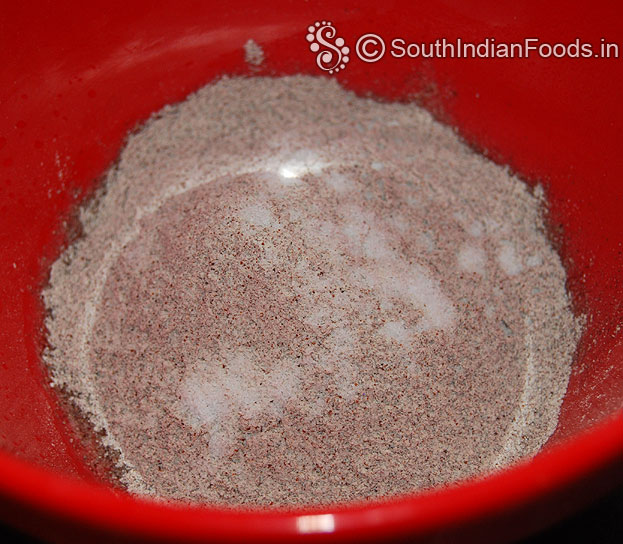 In a bowl add ragi flour and salt