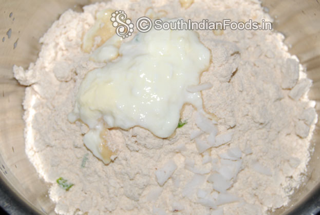 In a bowl add wheat flour, curd, salt, green chilli