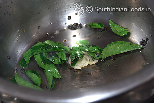 Heat oil add mustard, curry leaves & garlic