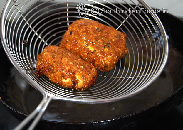 Drain extra oil then place it on absorbent paper then serve hot with tomato sauce