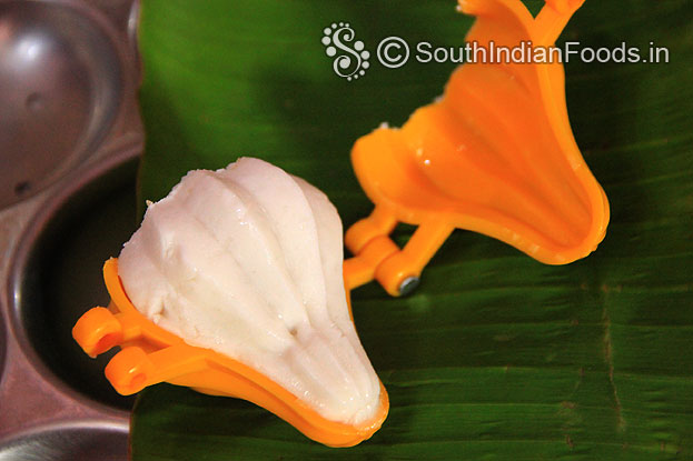 Remove raw modak from mould