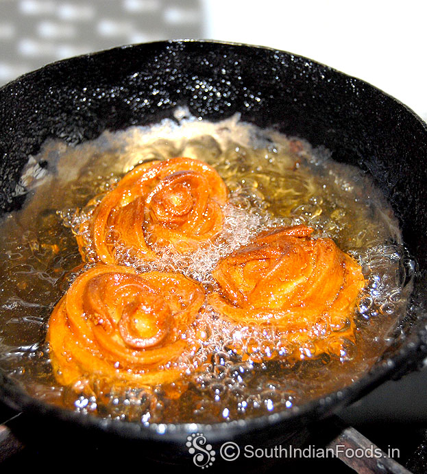 Flip over fry both sides till light brown