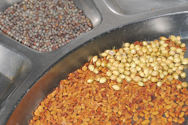 Dry roast fenugreek mustard coriander seeds let it cool.