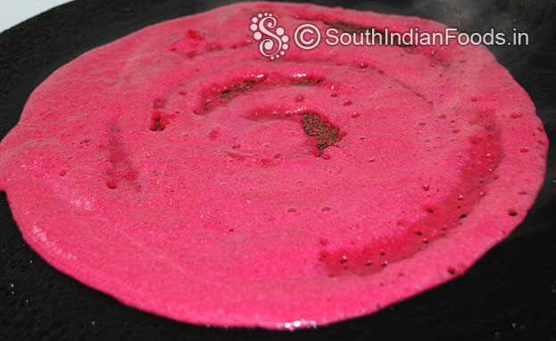 Heat iron dosa tawa, pour batter spread immediately