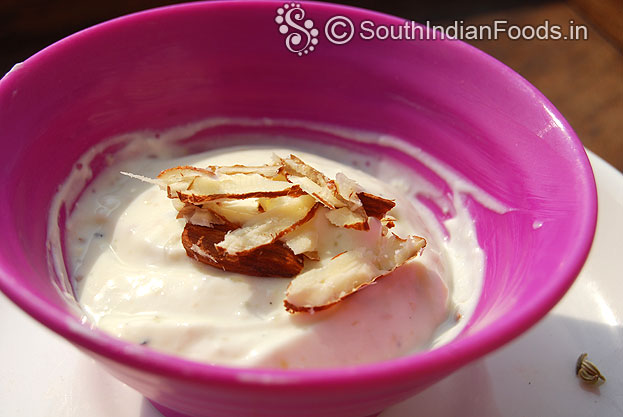Garnish with almond flakes, serve immediately
