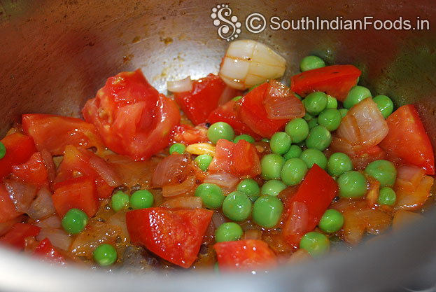 Heat pressure cooker with oil then add onion garlic