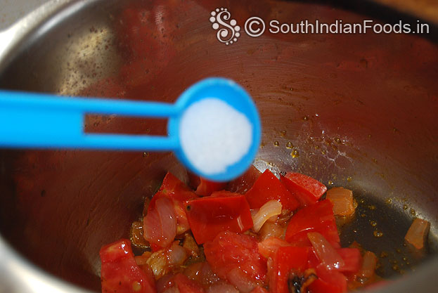 Heat pressure cooker with oil then add onion garlic