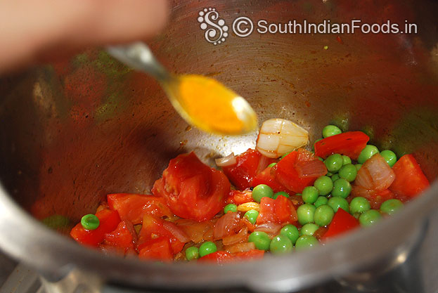 Heat pressure cooker with oil then add onion garlic