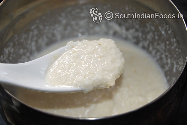 In a bowl add white rava & salt