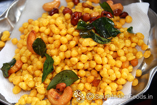 Add fried curry leaves, cashewnuts, groundnut mix well. Store in an airtight container use with in 7 days