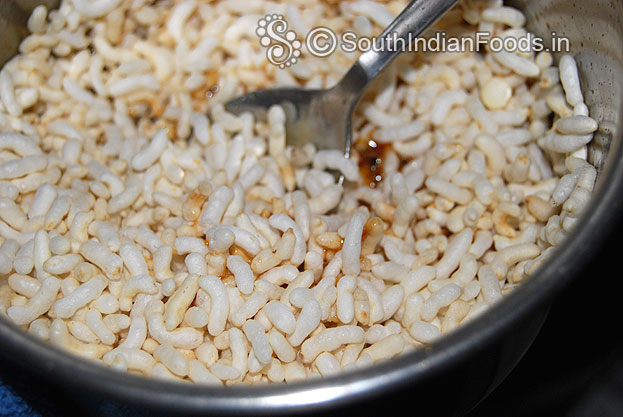 Add pori into jaggery syrup mix well