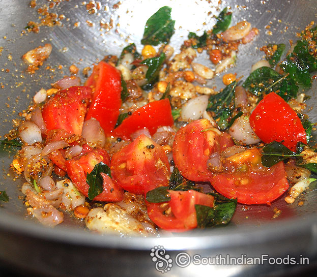 add tomato, saute till soft