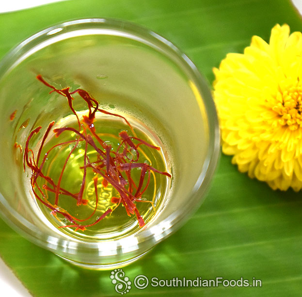 Soak saffron in warm water for 10 min