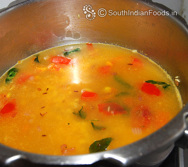 Let it boil, cover lid, & cook for 4 whistles