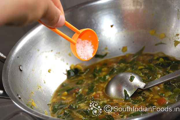 Add salt to kodi pasalai keerai sambar