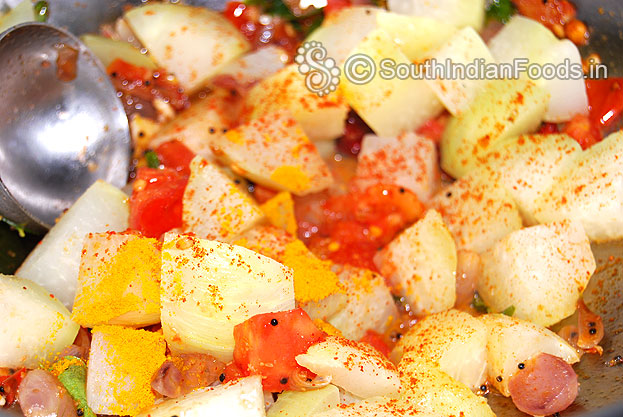 Add turmeric & red chilli powder & saute