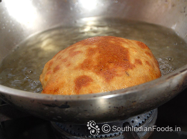 Flip over mangalore bun deep fry both sides till golden brown