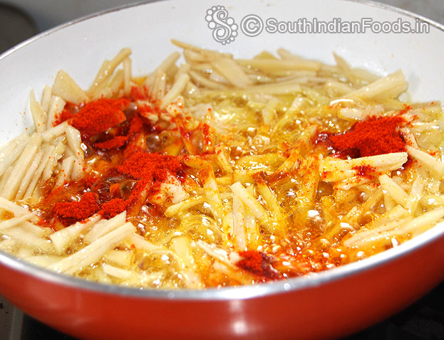 Add turmeric & red chilli powder