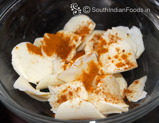 Add red chilli powder, turmeric powder, asafoetida and salt mix well