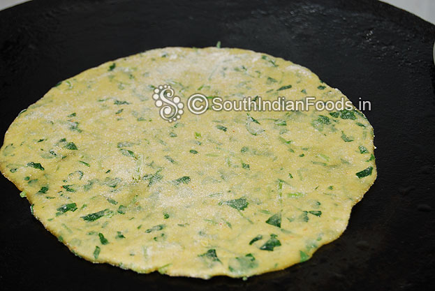 Heat iron dosa tawa place paratha & cook both sides