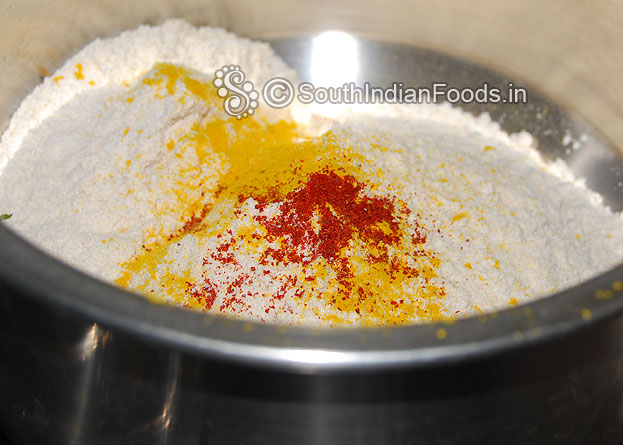 In a bowl add wheat flour salt turmeric red chilli powder