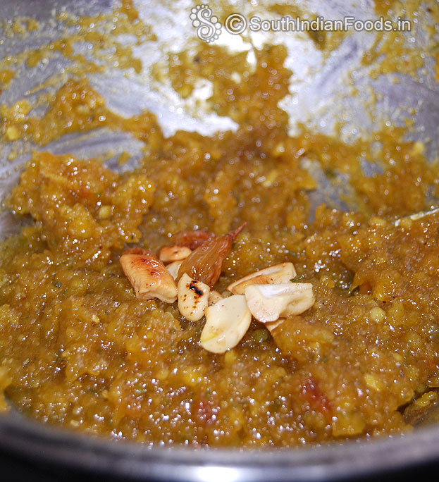 Add cashews and raisins