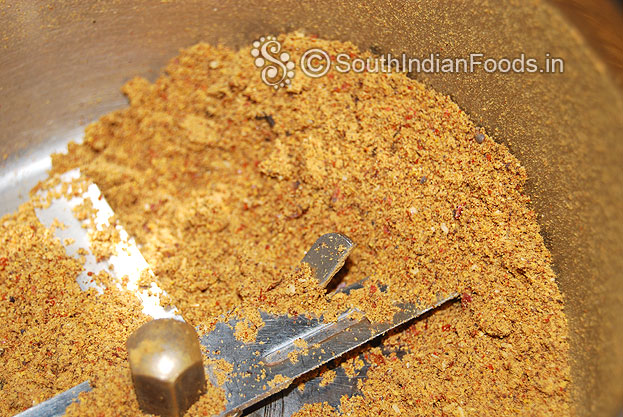 Put dry roasted ingredients in a mixie jar then grind to fine powder