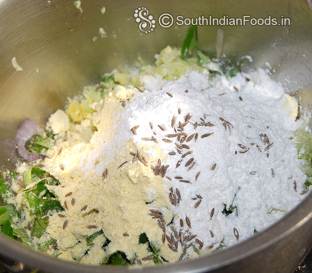 Add gram flour, rice flour, and cumin seeds