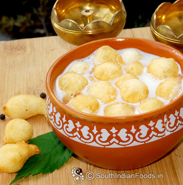 Fried paniyaram in coconut milk