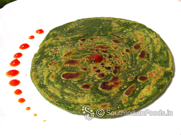 Palak paratha is ready serve with raita, layered soft crispy roti