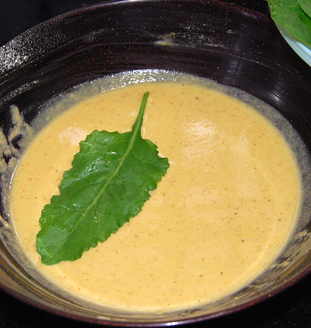 Dip spinach leaves in gram flour batter
