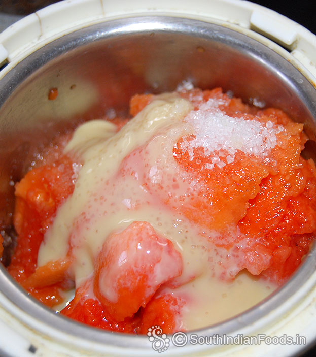 In a blender add, papaya, sugar & sweet condensed milk, blend well