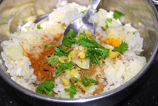 Add ginger, garlic, green chilli & coriander leaves