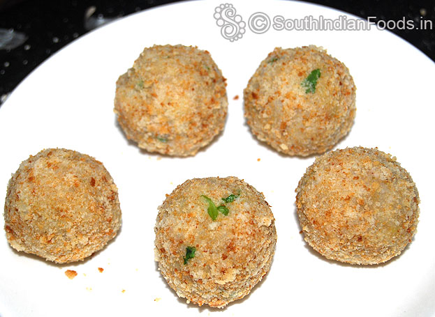 Breadcrumbs coated aloo poha balls ready