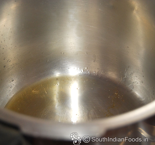 Heat pressure cooker with 1 tbsp oil