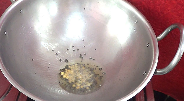 Heat oil, add mustard, chana dal & urad dal