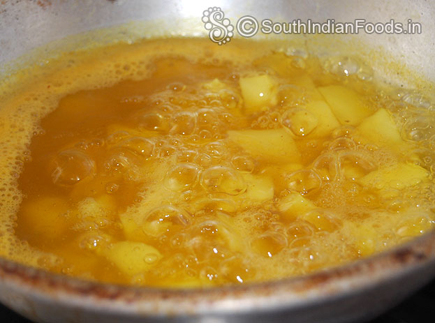 Peel off potato skin, cut into cubes, boil with turmeric & red chilli powder