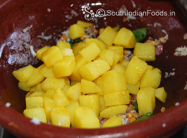Add boiled potatoes saute