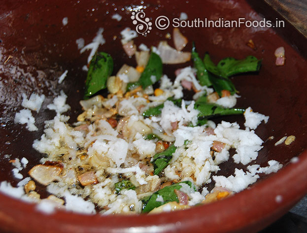 Add grated coconut saute