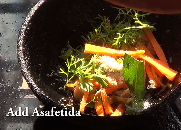 Add coriander leaves, asafoetida