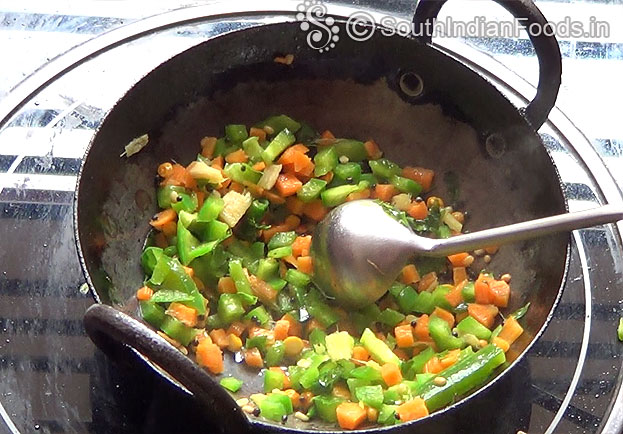 In a bowl add white rava & salt
