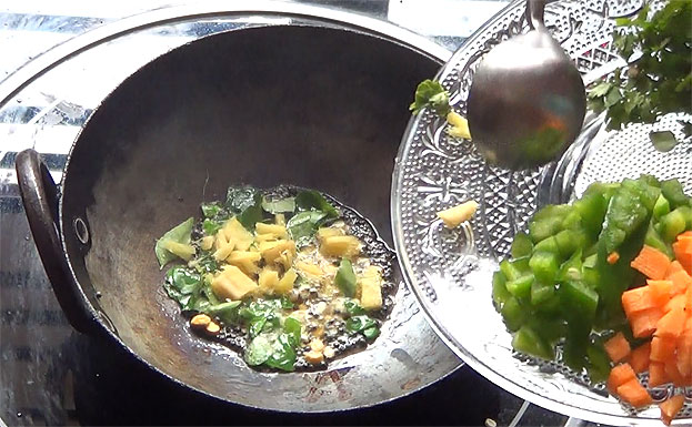 In a bowl add white rava & salt