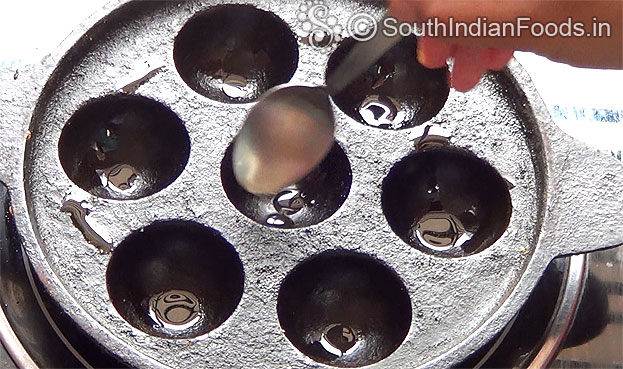 In a bowl add white rava & salt