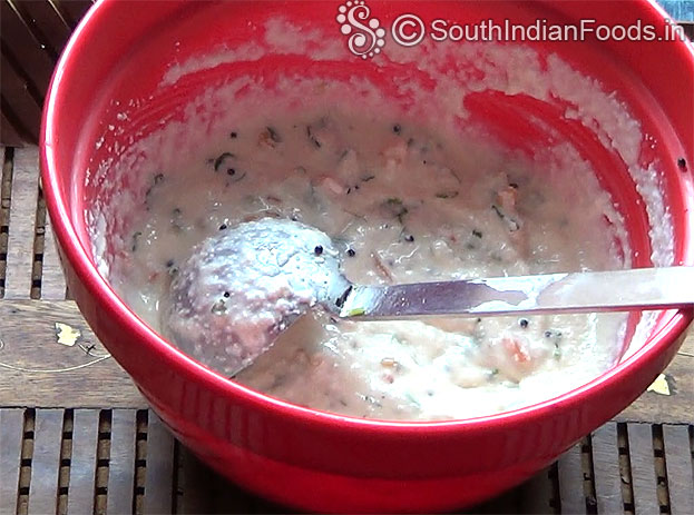 In a bowl add white rava & salt