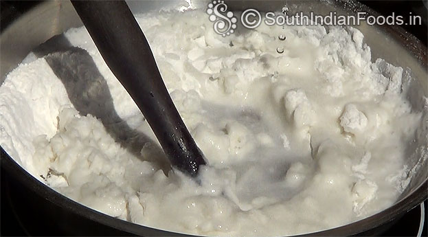 Add water, mix well till dosa batter consistency