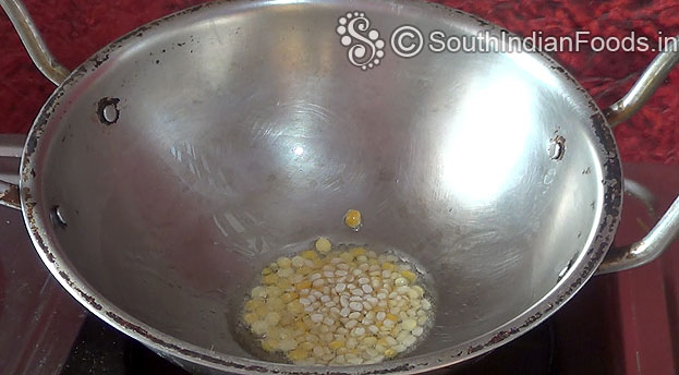 Heat oil in a pan, add chan dal, urad dal