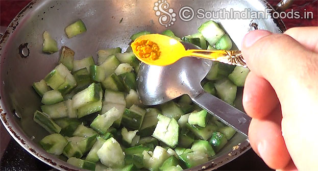 Heat same pan, add oil, ridge gourd & turmeric