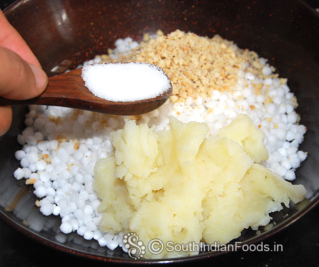In a bowl add soaked sago, ground peanut, mashed potato, & salt 