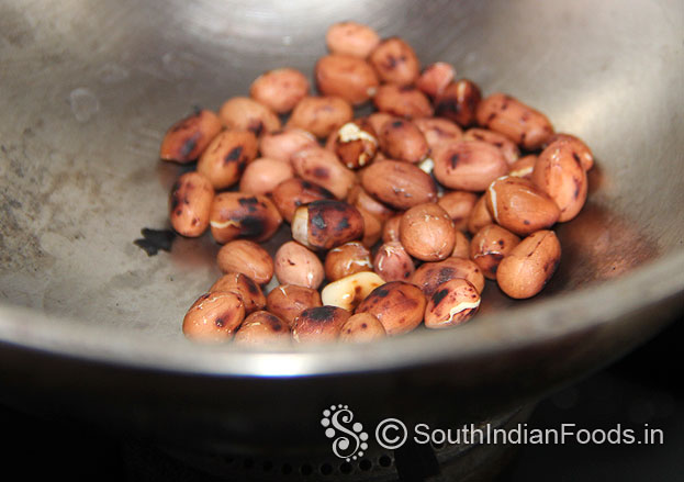 Dry roast peanuts coarsely grind